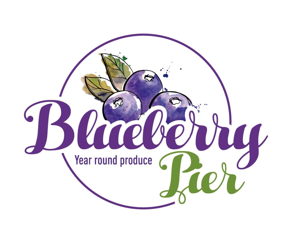 Blueberry Pier logo - Year Round Produce - A blue circle, blueberries, and words